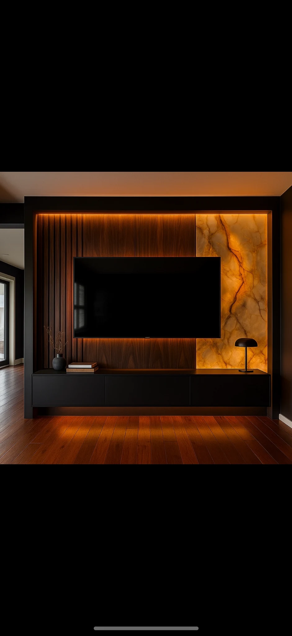 Illuminated wood and stone media wall with integrated cabinetry